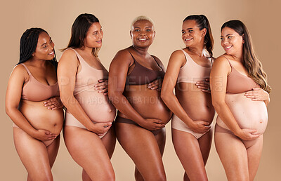Buy stock photo Happy women, body or holding pregnant stomach in support line, solidarity or community diversity on studio background. Pregnancy, friends and people in underwear for belly growth or mothers day pride