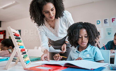 Buy stock photo Math, education or teacher helping a child in a classroom with learning development, growth or studying. Writing, notebook or black woman teaching, talking or speaking to a young African boy student