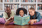Children in library, reading book and learning, education and  story for academic growth, happiness with friends. Knowledge, information and development, young students happy to learn and school