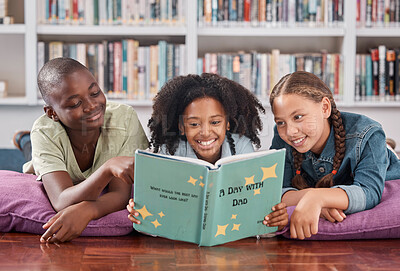 Buy stock photo Children in library, reading book and learning, education and  story for academic growth, happiness with friends. Knowledge, information and development, young students happy to learn and school
