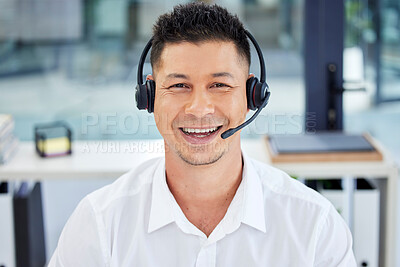 Buy stock photo CRM, portrait and Asian customer service employee happy to be working telemarketing in the office. Support, help and man agent, consultant or worker smiling on an online video call using a headset