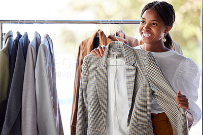 Buy stock photo Retail, shopping and black woman in store with clothes choice on rack for sale, discount and promotion. Fashion, designer boutique and happy girl customer with clothing, outfit and wardrobe products