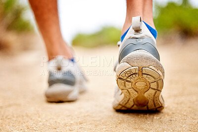 Buy stock photo Fitness, shoes and sports person walking, running and man training on path. Back closeup of runner, feet and sneakers on ground for exercise, park workout and outdoor trekking, hiking and wellness 