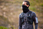 Man, runner and mask for fitness exercise, workout or trekking in the nature outdoors. Sporty male, person or guy ready for running, exercising or healthy cardio, hiking or sports training