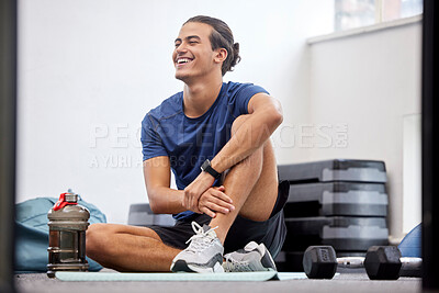 Buy stock photo Fitness, relax or happy sports man at gym after training, workout or exercise resting on a break. Tired, smile or healthy athlete with fatigue relaxing on a mat alone after exercising for body goals