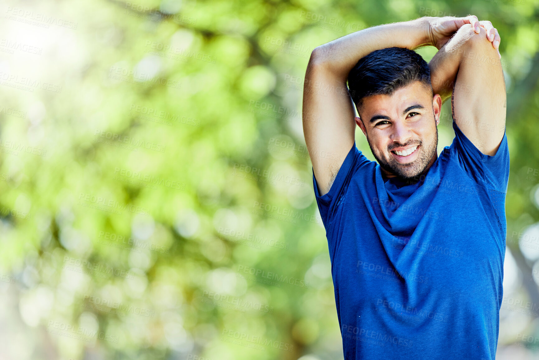 Buy stock photo Portrait, mockup and stretching with a sports man outdoor in nature for a warm up before exercise. Fitness, mock up and training with a male athlete on a natural green background for a workout