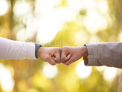 Buy stock photo Fist bump in nature, closeup and friends show support, solidarity or partnership for victory, winning together or commitment. People, outdoor or hand gesture for team building, target or goal success