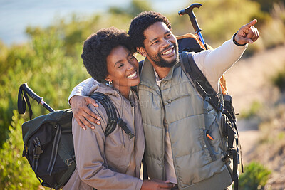 Buy stock photo Black couple, happy and pointing on hike adventure for outdoor exploration, sightseeing and journey. Happiness, love and care of people trekking with backpack together with excited smile for travel.