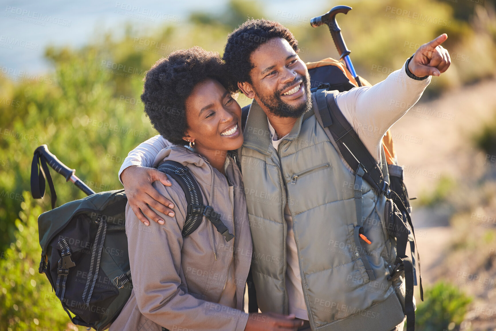 Buy stock photo Black couple, happy and pointing on hike adventure for outdoor exploration, sightseeing and journey. Happiness, love and care of people trekking with backpack together with excited smile for travel.