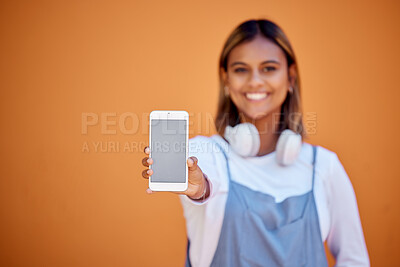 Buy stock photo Portrait, mockup and woman with smartphone, smile and screen with girl on brown studio background. Face, female and girl with cellphone, space or connection for social media, chatting and on backdrop