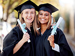 Graduation, degree and portrait of friends together happy for academic success at their university campus. Certificate, achievement and young women students with college diploma or scroll to graduate