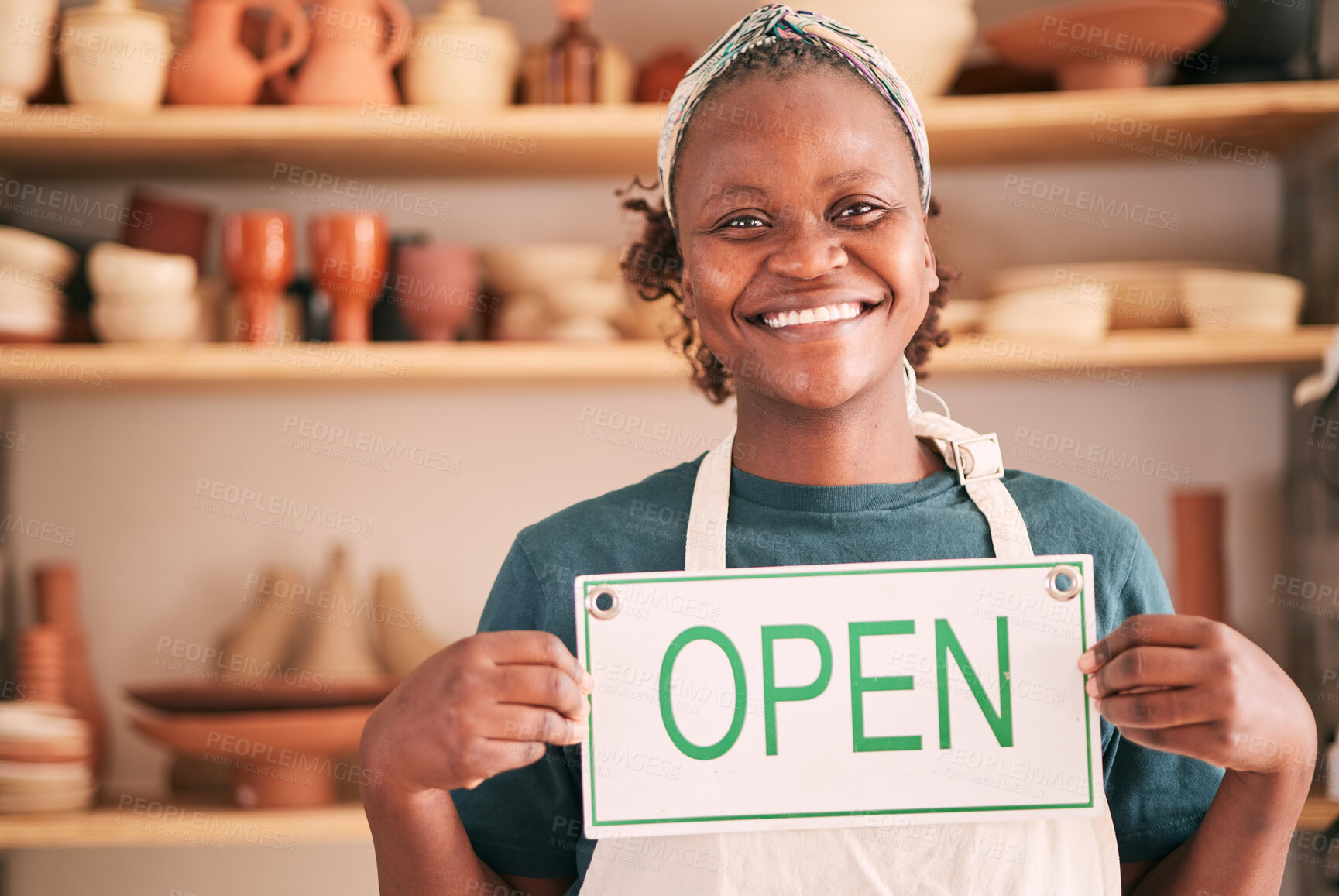 Buy stock photo Small business, pottery and black woman with open sign for creative workshop, art studio and startup. Manager, entrepreneur and girl happy for welcome to ceramics, clay sculpture and artwork store