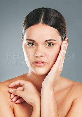 Buy stock photo Beauty, portrait and woman hands touching face in studio for wellness, luxury facial and cosmetics. Young female model, aesthetic skincare and dermatology from healthy shine, glow and salon results 