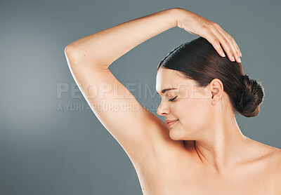 Buy stock photo Cleaning, armpit and woman with wellness, health and body smell of a model with studio mockup. Isolated, young female and person with skincare, hygiene and deodorant fragrance underarm with sweat