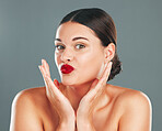 Woman lips with lipstick, kiss face and makeup with red cosmetics and playful pout isolated on studio background. Portrait, beauty and skincare with cosmetic care, wellness and glow, facial and fun