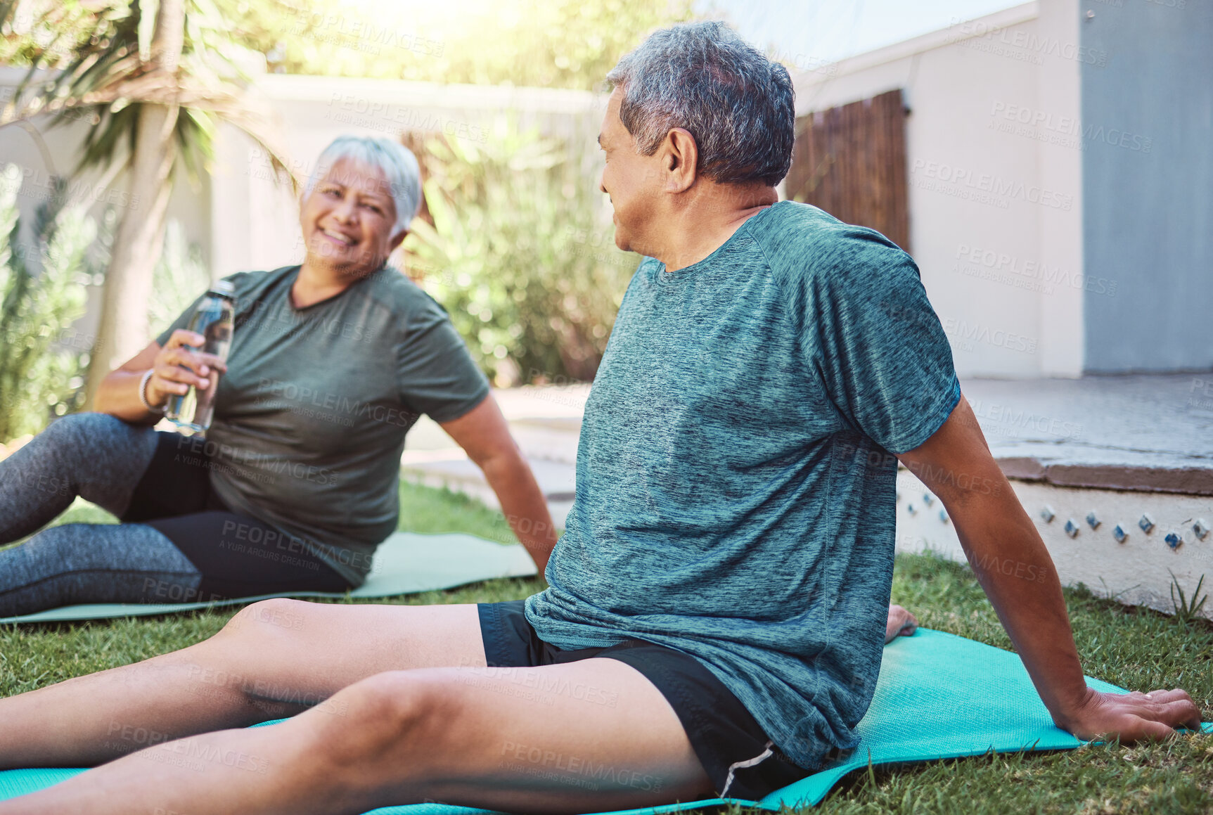 Buy stock photo Yoga, fitness and senior couple in garden with exercise, cardio and workout together on grass for retirement health. Water bottle, nutrition and healthy elderly people or friends in backyard pilates