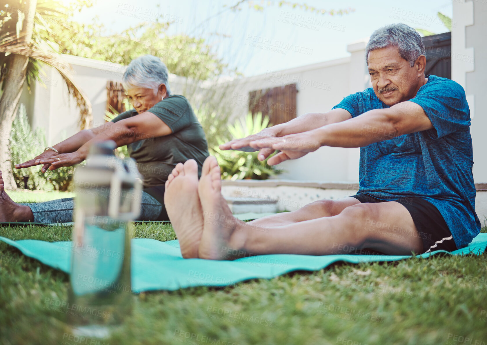 Buy stock photo Fitness, yoga and senior couple stretching for exercise, zen and relax in a garden, peace and calm. Stretch, workout and elderly man with woman in a yard for training, pilates and cardio in Mexico