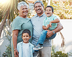 Grandparents, children portrait and garden outdoor with love, care and kid support. Smile, happy and Mexican family together with kid and senior people in sunshine in a park with children in nature