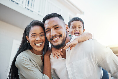 Buy stock photo Mother, father and child with smile for family portrait, piggyback or bonding outside the house. Happy mom and dad holding son on back smiling in happiness for holiday break or weekend together