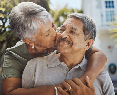 Buy stock photo Black senior couple, hug and kiss for love, retirement holiday and happiness outdoor together. African man, woman kissing and happy quality time or marriage relationship bonding on travel vacation