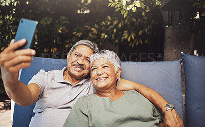 Buy stock photo Relax, smile and senior couple with a selfie on an outdoor couch during retirement holiday in Spain. Happy, communication and elderly man and woman with a photo for a memory, streaming and social app