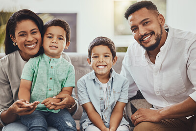 Buy stock photo Father, mother and children with smile for family portrait, holiday break or weekend relaxing on living room sofa at home. Happy dad, mom and kids smiling for fun bonding time or relationship indoors