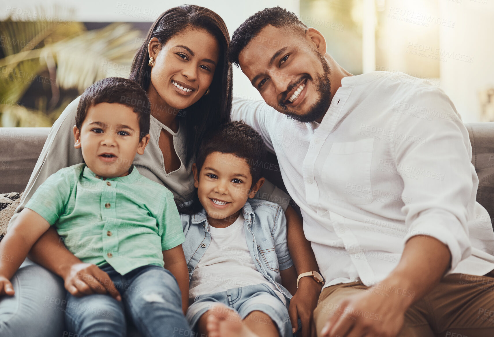 Buy stock photo Father, mother and kids with smile for family portrait, holiday break or weekend relaxing on living room sofa at home. Happy dad, mom and children smiling in joy for fun bonding relationship indoors