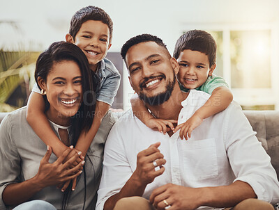 Buy stock photo Mother, father and children hug for family portrait with smile relaxing together for holiday or weekend at home. Happy mom, dad and kids smiling for fun hug, love or care in relax on living room sofa