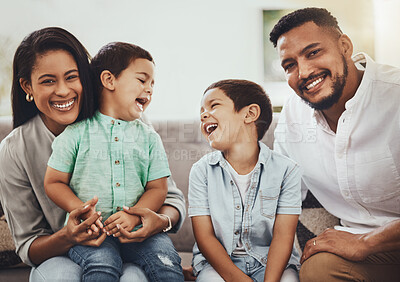 Buy stock photo Father, mother and smile with children of family spending holiday break or weekend together on living room sofa at home. Happy dad, mom and kids laughing in joy for fun bonding relationship indoors