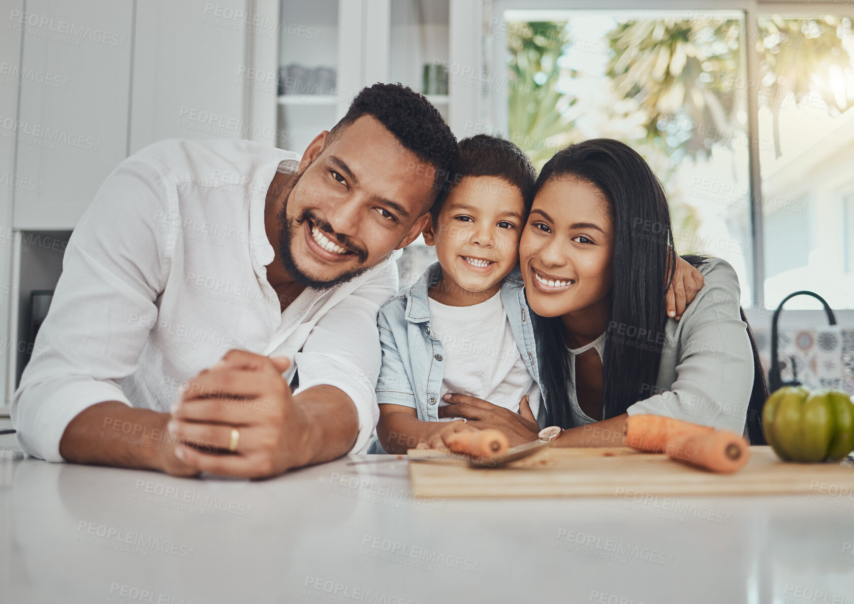 Buy stock photo Kitchen, portrait and parents with their boy child to cook dinner, supper or lunch together. Love, smile and happy family from Brazil preparing healthy food or meal with vegetables in their house.