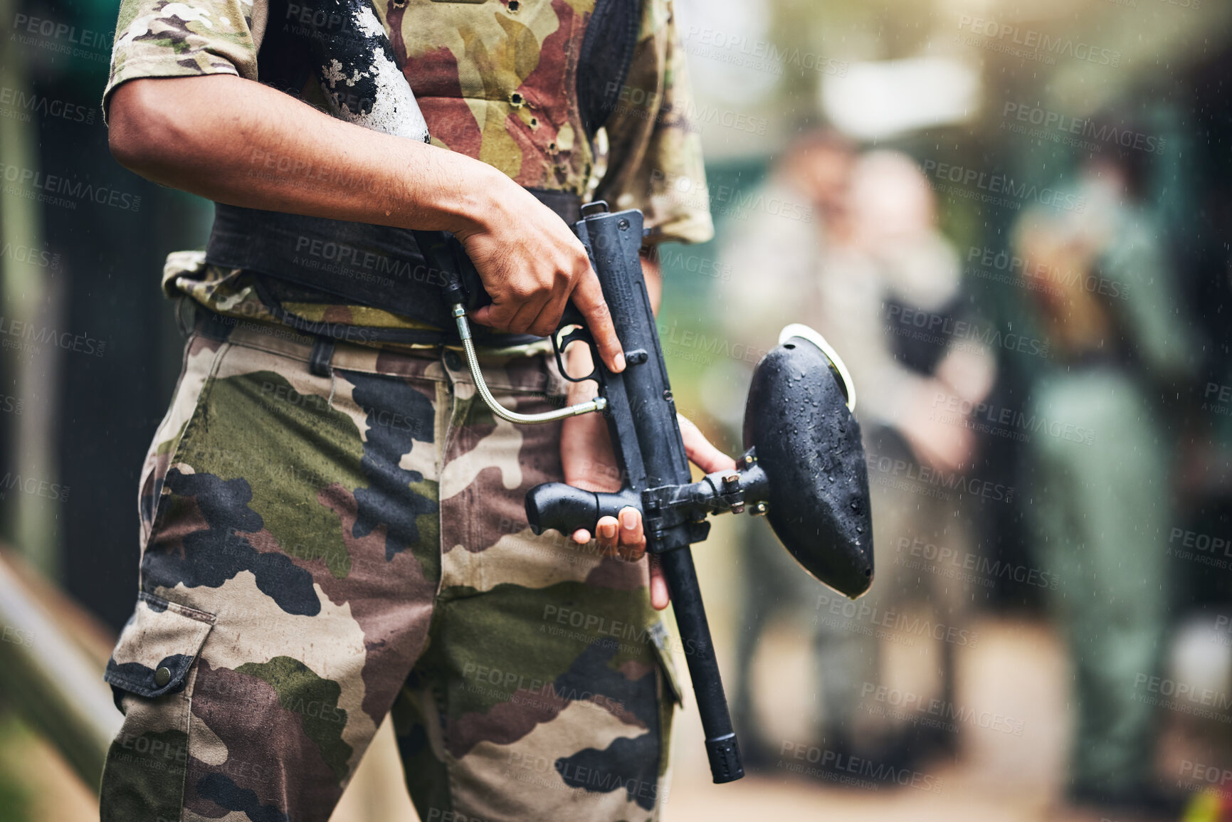 Buy stock photo Soldier, paintball gun and ready for war, game or military fight in extreme sports in the outdoor arena. Sporty army player in holding fire in preparation for match start, begin or commence at field