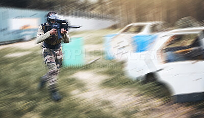 Buy stock photo Paintball, gun or man running in a shooting game with fast action on a fun battlefield on holiday. Military mission, fitness or player with speed, weapons gear for survival in an outdoor competition
