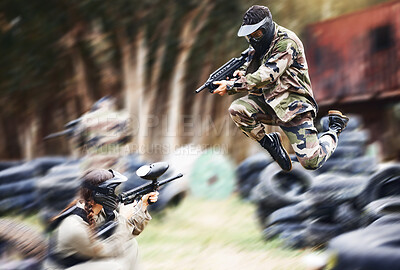 Buy stock photo Paintball, gun or people play in a shooting game with fast action on a fun battlefield on holiday. Man on mission, fitness or player jumping with weapons gear for survival in an outdoor competition