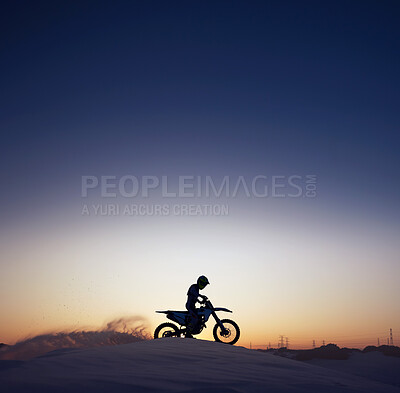 Buy stock photo Silhouette, sport and riding motorcycle against night, sky and background in nature, extreme sports and adrenaline. Biking, motorbike and person driving on dirt road, dark and shadow, stunt and free