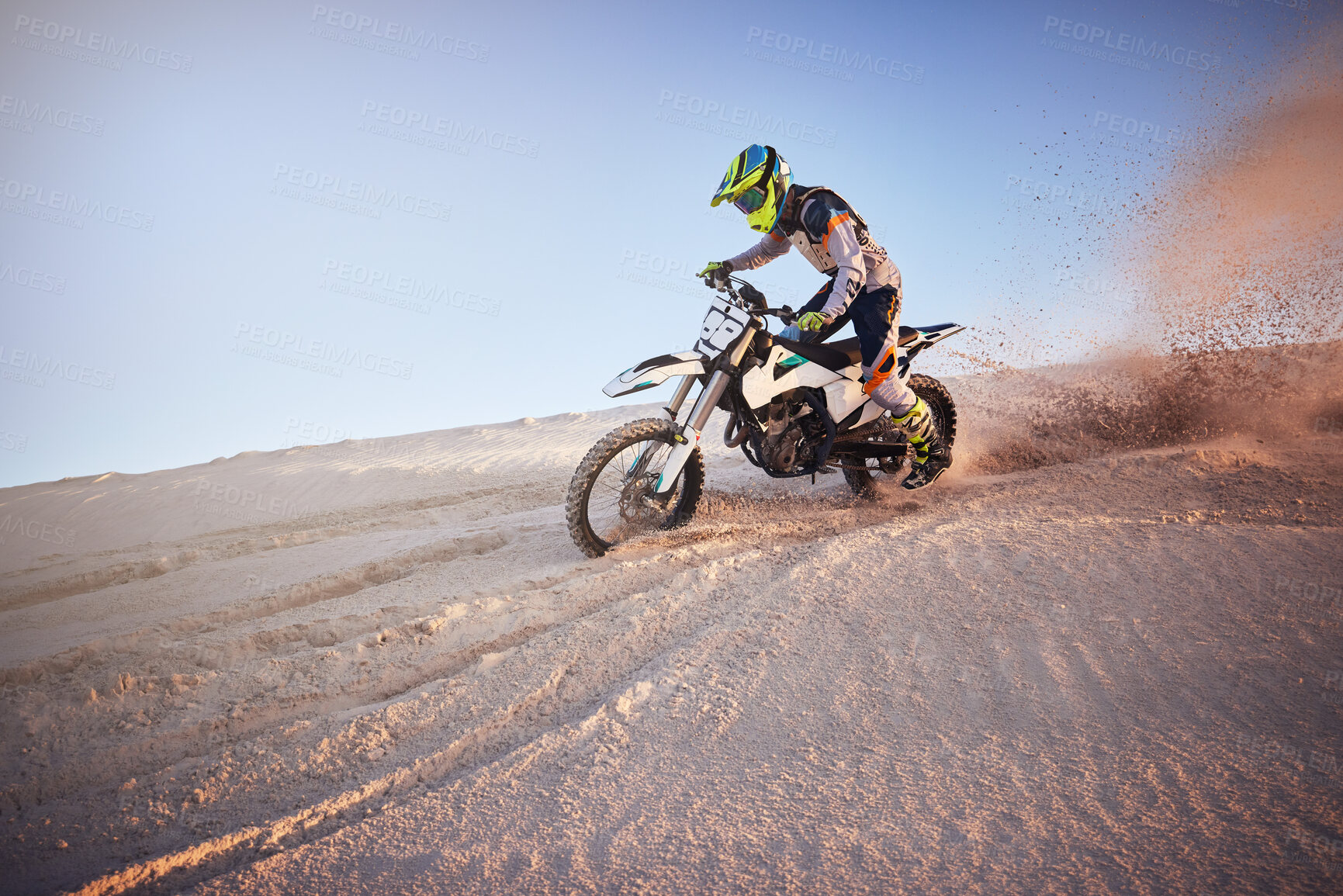Buy stock photo Moto cross, Dubai desert or man on bike stop for sport workout, sunset ride or exercise on hill. Nature, sky or person on motorcycle freedom adventure in sand for training, fitness or race sports