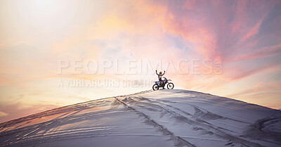 Buy stock photo Desert, sunset and man riding a motorcycle for exercise, fitness or skill training in nature. Extreme sports, dusk and male athlete on a bike for an outdoor evening workout in the sand dunes in Dubai