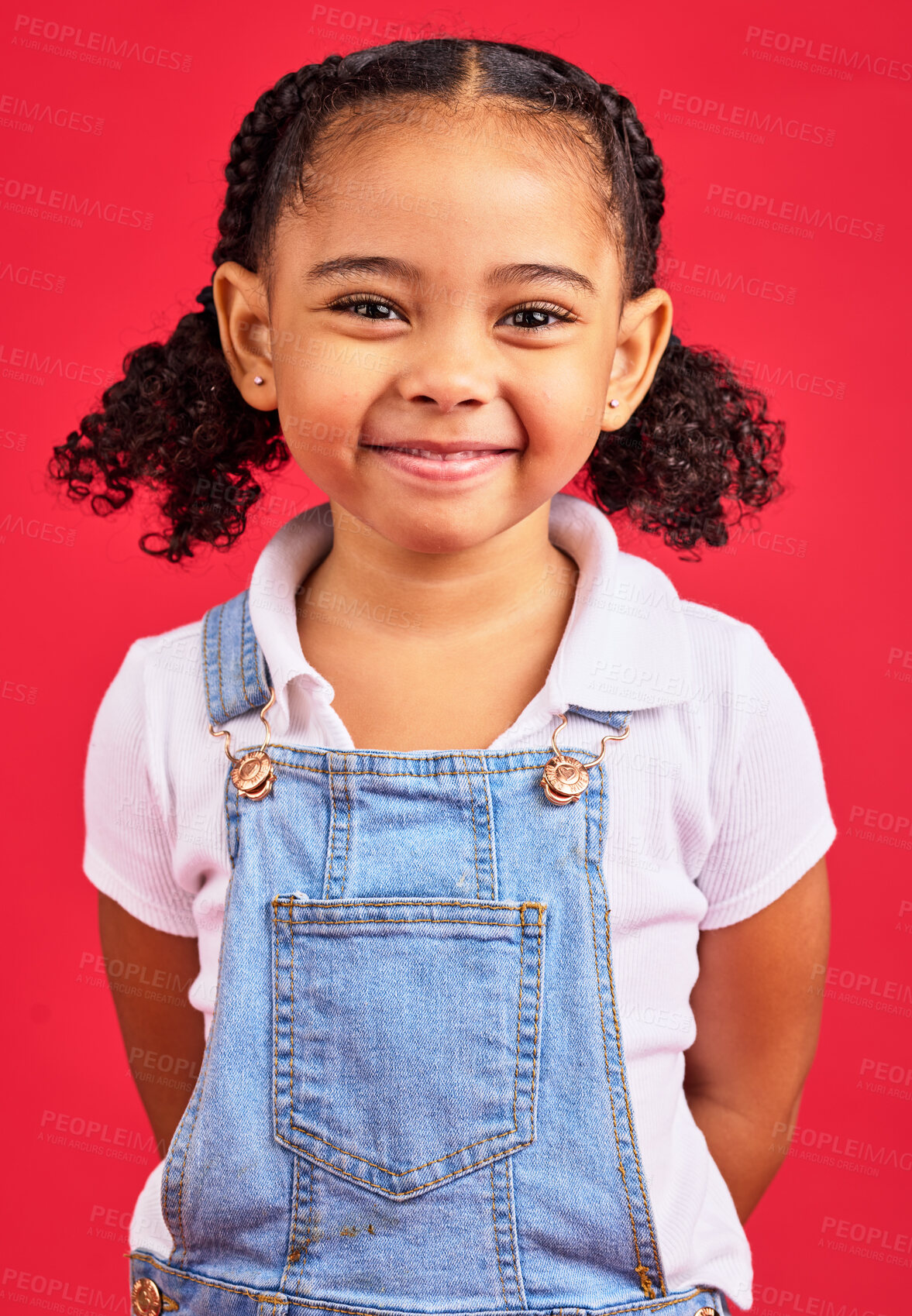 Buy stock photo Portrait, child and girl in studio, happy and smile against a red background with mockup. Face, cheerful and trendy toddler standing against space, excited and positive, smiling and posing isolated
