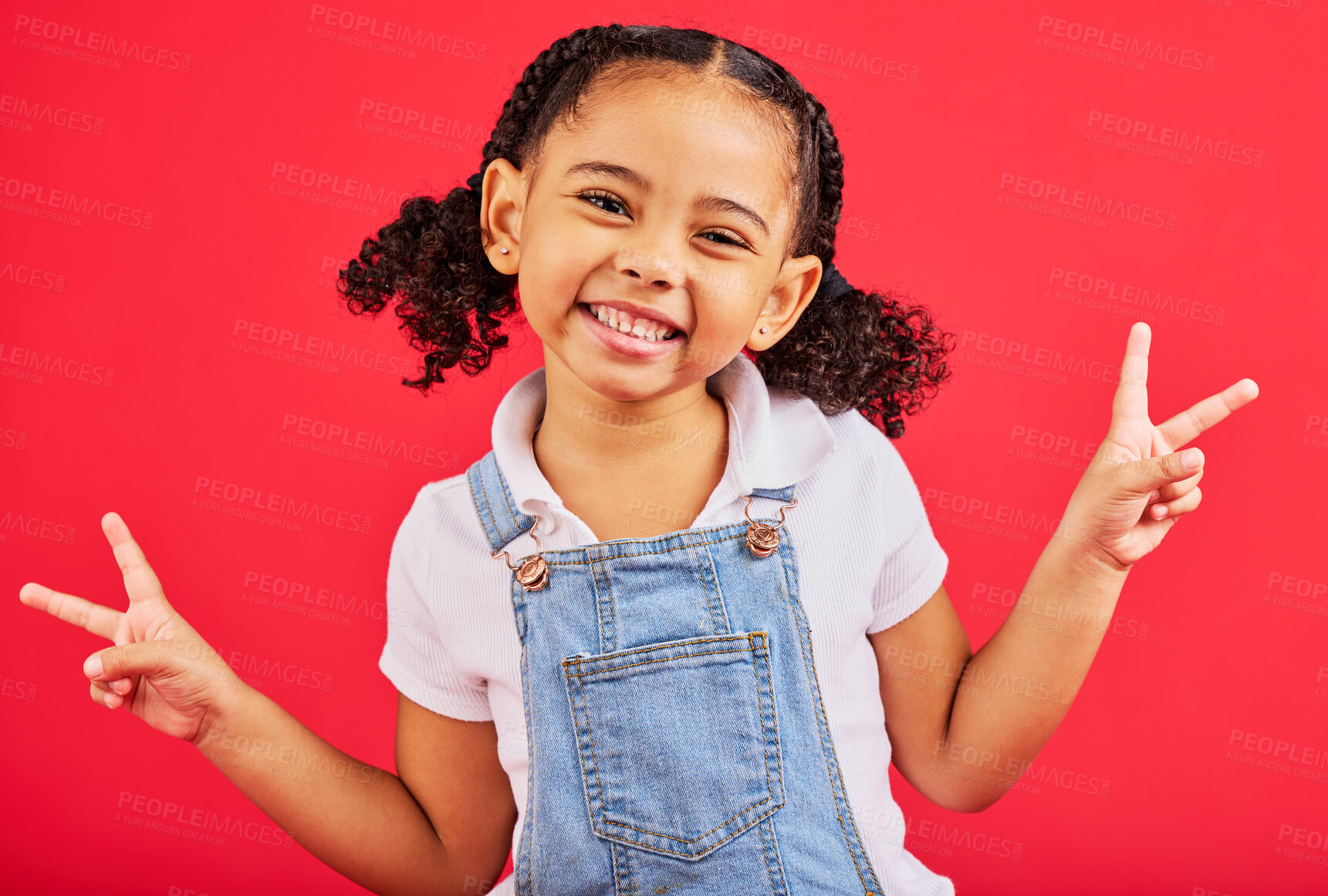Buy stock photo Happy, peace sign and portrait of girl smile on red background with trendy, stylish and cute summer outfit. Kids fashion, freedom and face of child with emoji, comic and meme hand gesture in studio