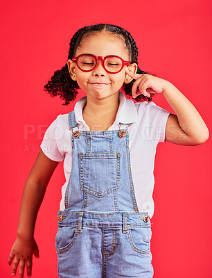 Buy stock photo Vision, glasses and portrait of child thinking with eyes closed and isolated on red background. Ideas, eyesight and happy playful expression, goofy little girl in spectacles for eyesight in studio.