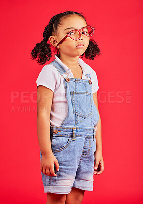 Buy stock photo Portrait, glasses and bored with a black girl on a red background in studio for vision or eyesight. Kids, sad or unhappy with a female child wearing a new frame prescription spectacles for correction