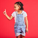 Mockup, black girl and finger for space, product placement and kid on studio background. African American female child, young person and brand development for advertising, happiness and cheerful