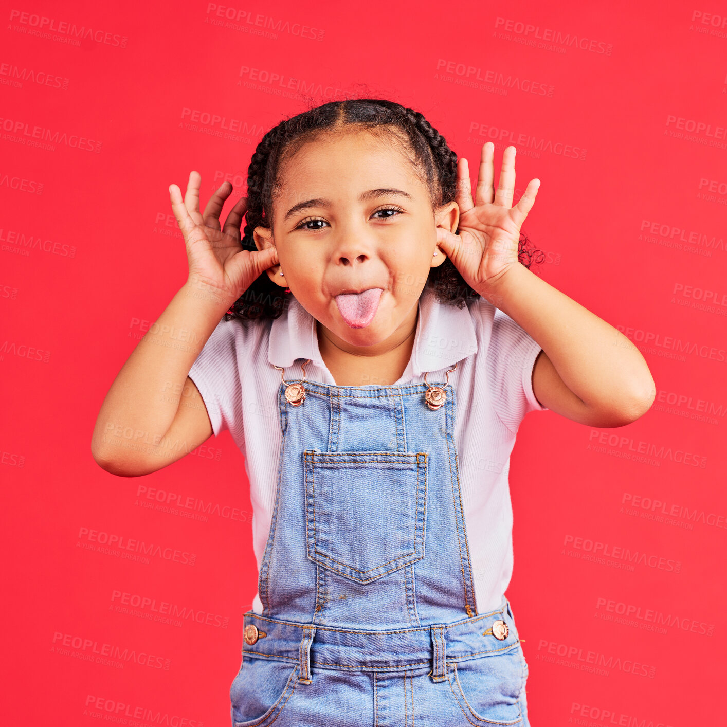 Buy stock photo Child, portrait and tongue out on isolated red background in goofy, silly games and playful facial expression. Happy, kid and little girl with funny face in comic emoji, charades and studio activity