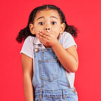 Shocked child, portrait and hand on mouth in secret, oops and mistake facial expression on isolated red background. Kid, little girl and surprised face in gossip, news or emoji at studio announcement