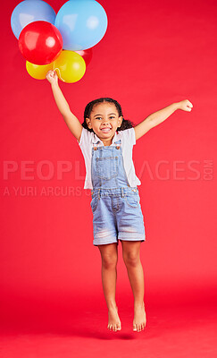 Buy stock photo Little girl, portrait or jumping with balloons on isolated red background for birthday party, celebration or fun event. Smile, happy or energy child with air, flying or inflatable accessory in studio