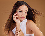 Gold beauty, face glitter and model with luxury eyeshadow, cosmetics product and skincare glow. Makeup, wind in hair or aesthetic portrait woman with jewelry ring, accessories and vitiligo healthcare