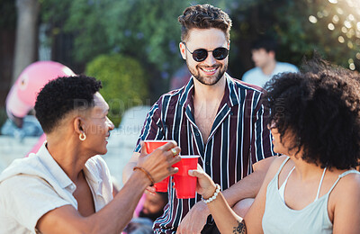 Buy stock photo Party, diversity and cheers with friends outdoor together in summer for a social gathering or celebration event. Alcohol, toast or birthday with a young man and woman friend group celebrating outside