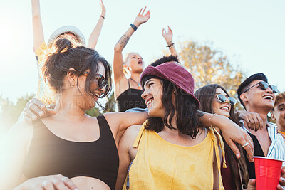Buy stock photo Couple of friends, party and drinks outdoor to celebrate at  festival, concert or summer social event. Women people in crowd together while dancing, happy and drinking alcohol with lgbt partner