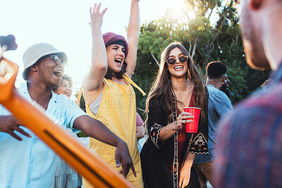 Buy stock photo Music, drinks and friends dancing outdoor to celebrate at  festival, concert or summer social event. Diversity young men and women people together while excited, happy and drinking alcohol at a party
