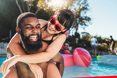Buy stock photo Pool party, love and couple piggyback, having fun or bonding. Swimming, romance diversity and happy black man carrying woman in water and laughing at comic joke or meme at summer event or celebration