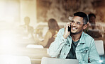 Creative man, phone and smile for communication, networking or conversation at coffee shop. Happy male freelancer smiling for call, discussion or startup with smartphone by laptop at cafe restaurant